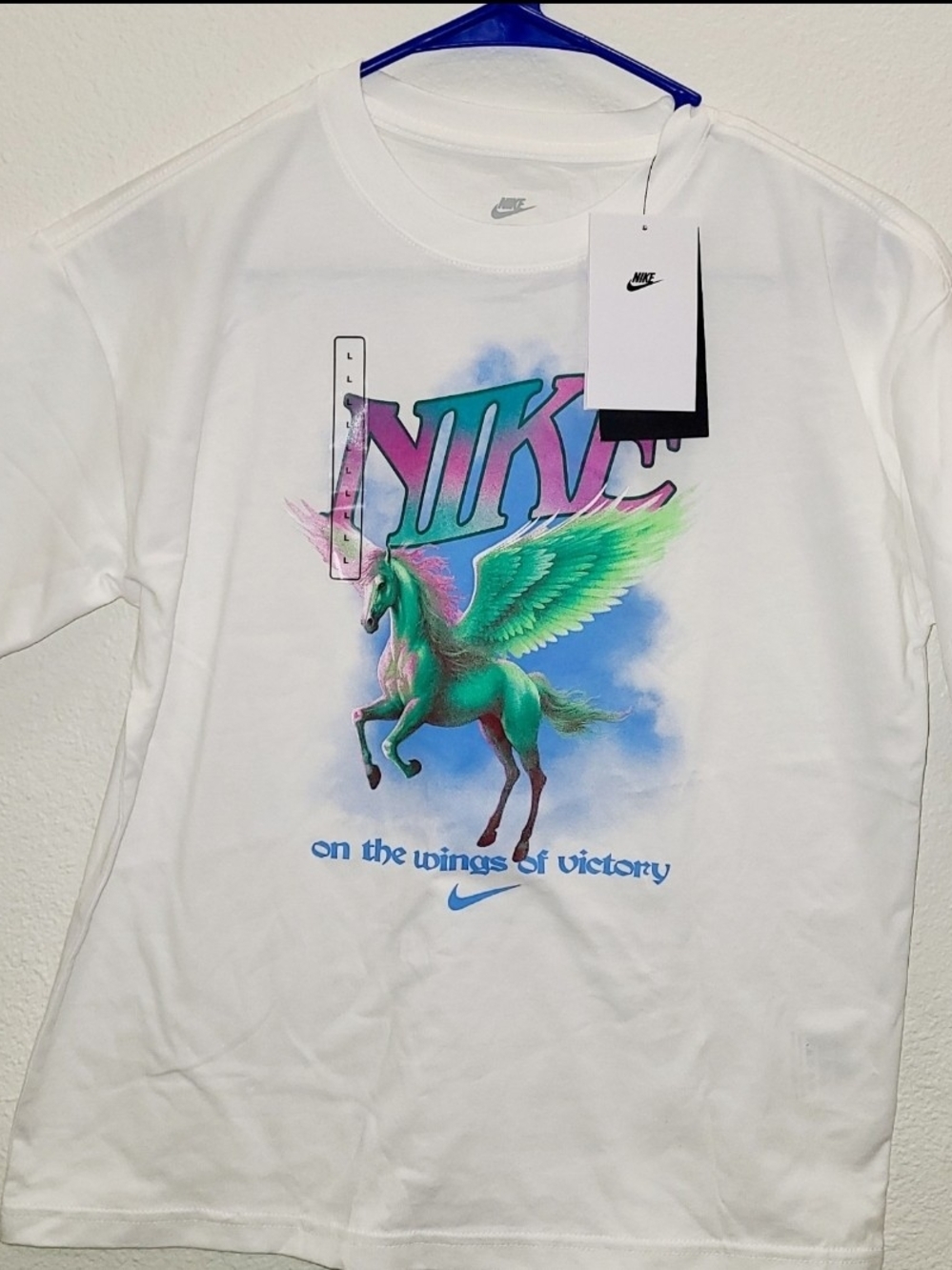 Nike White Kids T-Shirt with Teal & Green Pegasus Graphic